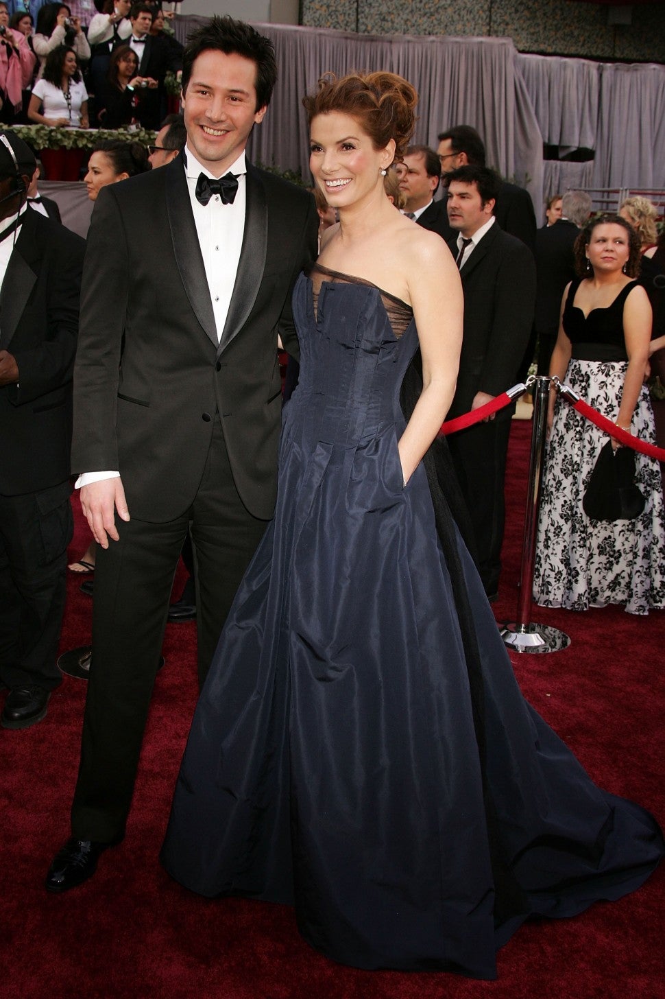 Sandra Bullock and Keanu Reeves arrive to the 78th Annual Academy Awards at the Kodak Theatre on March 5, 2006 in Hollywood, California.