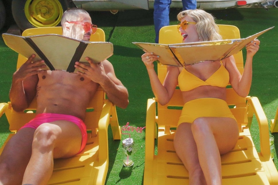 Taylor Swift in yellow bikini in calm down video