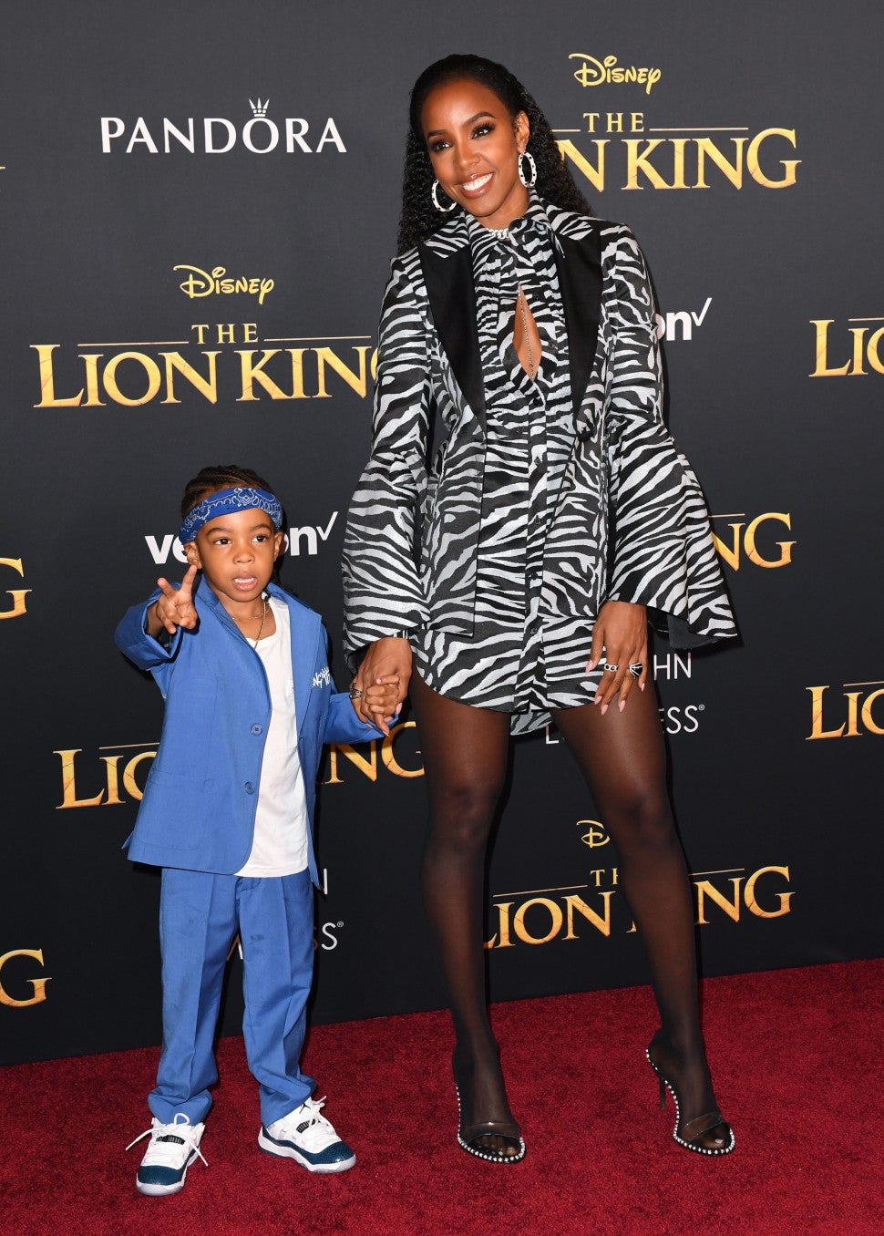 Kelly Rowland and Son Lion King Premiere