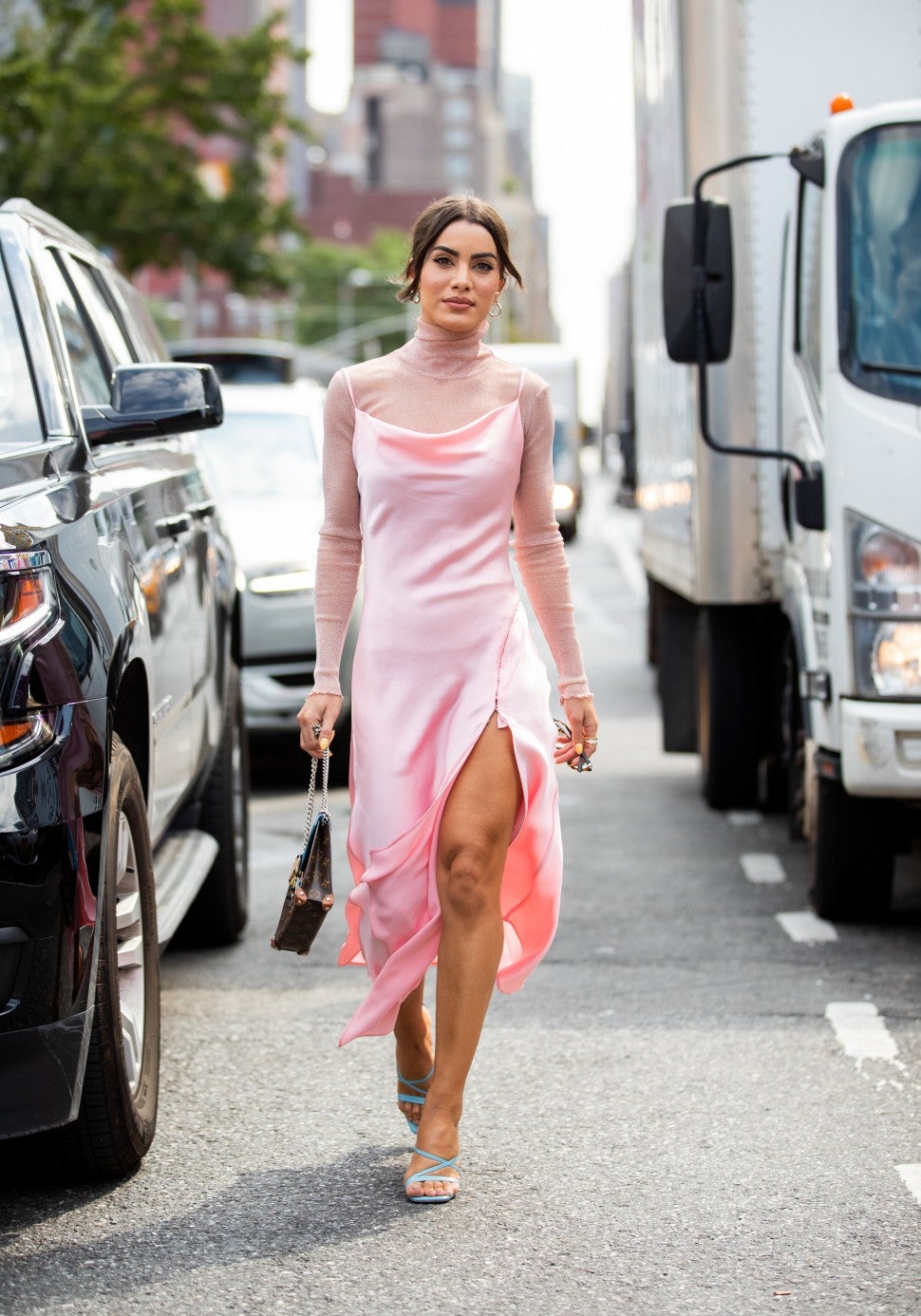 Camila Coelho in pink dress NYFW street style