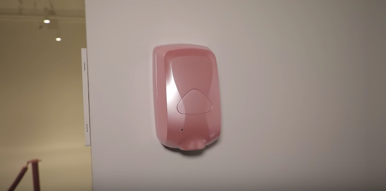 pink hand sanitizer dispenser Kylie Cosmetics office