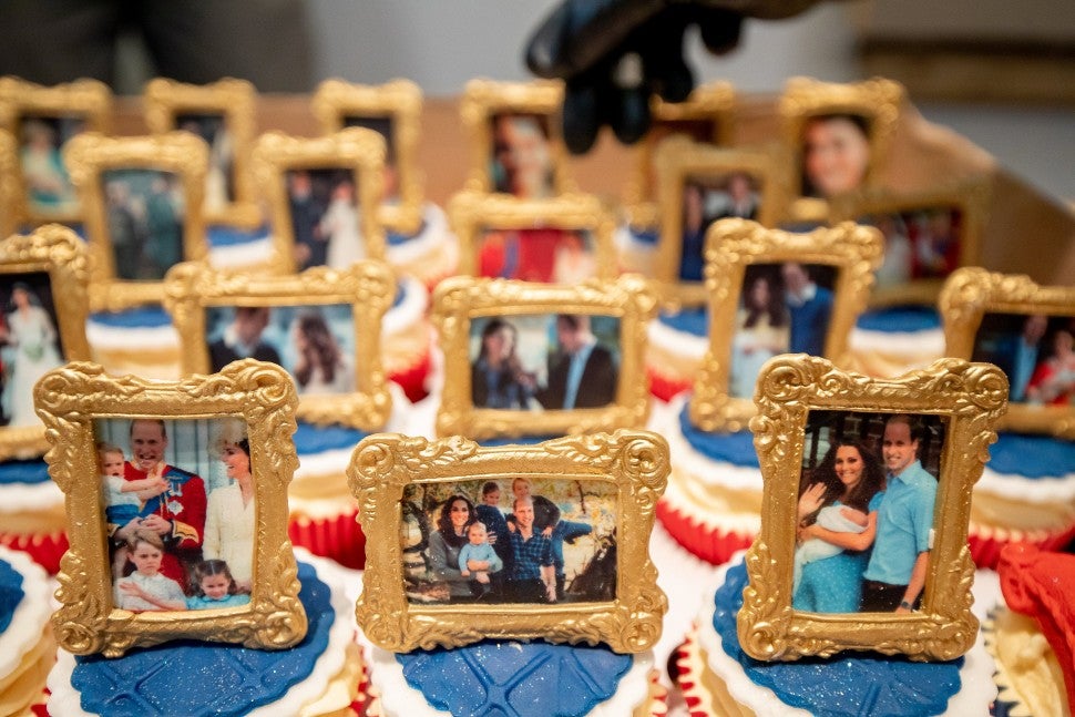 Cakes containing photographs of the royal couple are seen as Prince William, Duke of Cambridge and Catherine, Duchess of Cambridge visit the Khidmat Centre on January 15, 2020 in Bradford, United Kingdom. 