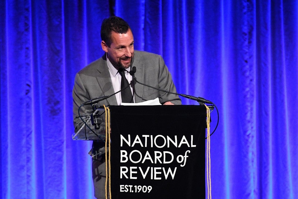Adam Sandler accepts the award for Best Actor for Uncut Gems onstage during The National Board of Review Annual Awards Gala 