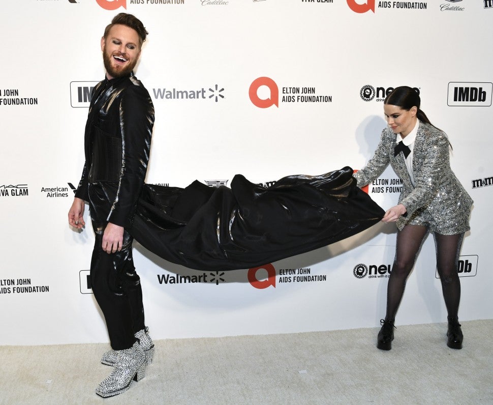 Bobby Berk and Emily Hampshire attend the 28th Annual Elton John AIDS Foundation Academy Awards Viewing Party Sponsored By IMDb And Neuro Drinks on February 09, 2020 in West Hollywood, California.
