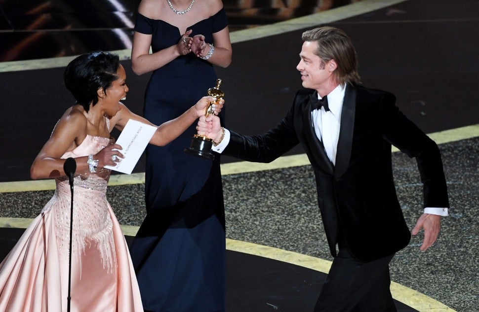 Regina King and Brad Pitt at the 2020 Oscars