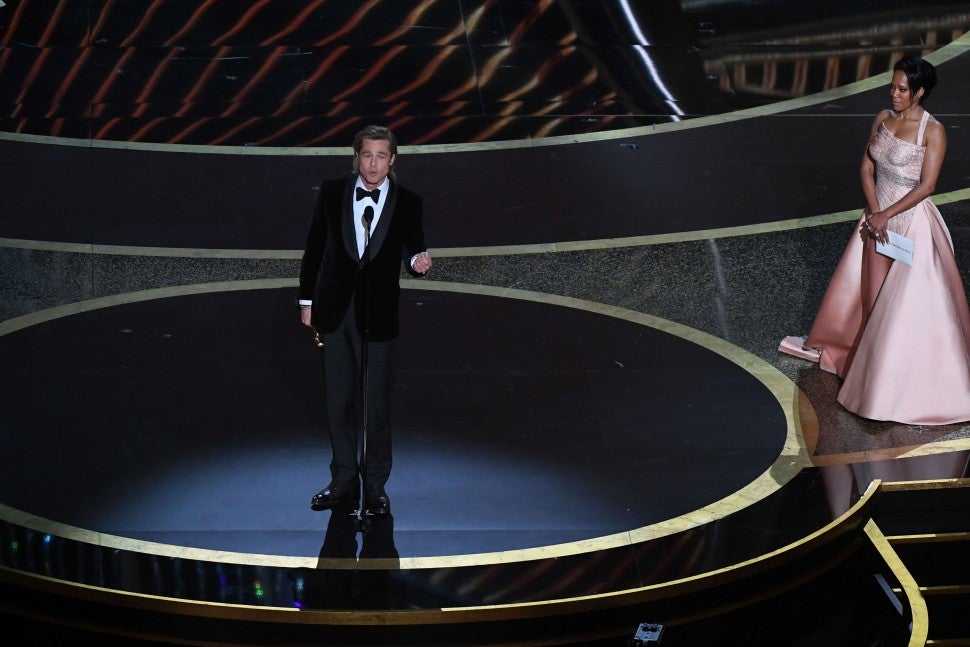 Regina King and Brad Pitt at the 2020 Oscars