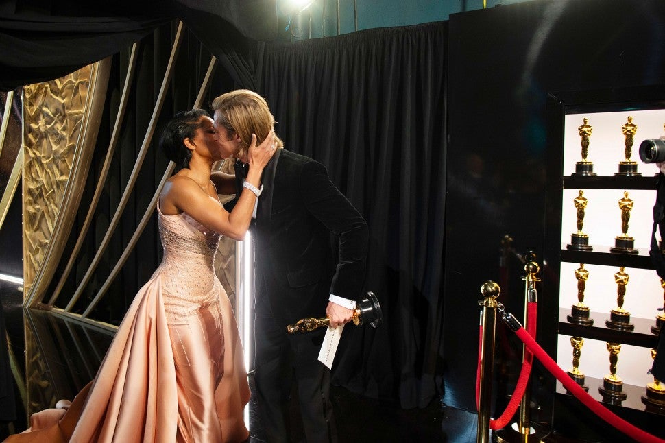 Regina King and Brad Pitt at the 2020 Oscars