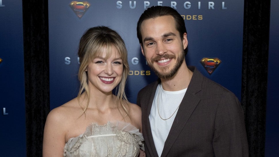 Melissa Benoist and Chris Wood at the red carpet for supergirl 100th episode celebration 