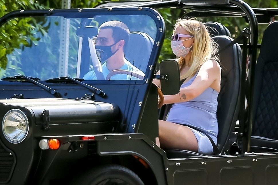 Joe Jonas and Sophie Turner in Moke Jeep
