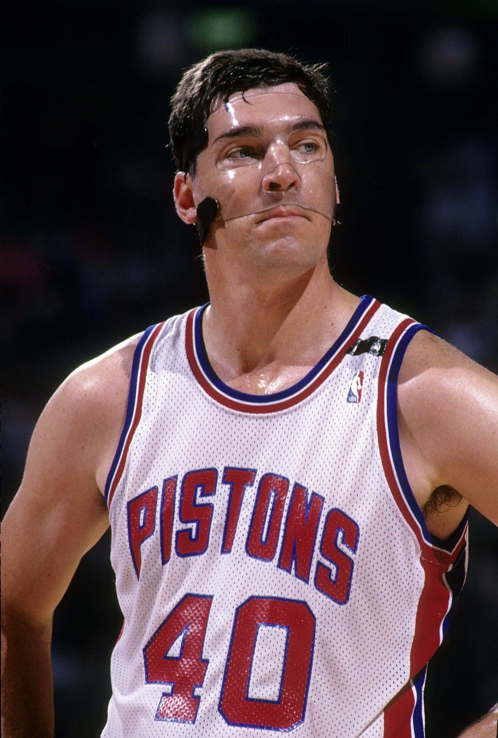 Bill Laimbeer #40 of the Detroit Pistons stand on the court during a early circa 1990's NBA basketball game at the the Palace of Auburn Hills in Detroit, Michigan. Laimbeer played for the Pistons from 1981-94.