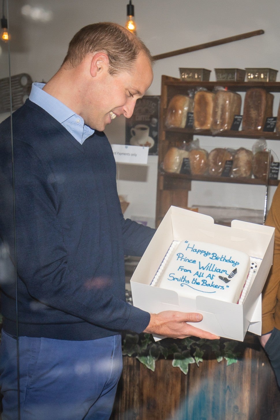 Prince William, Duke of Cambridge is presented with a birthday cake