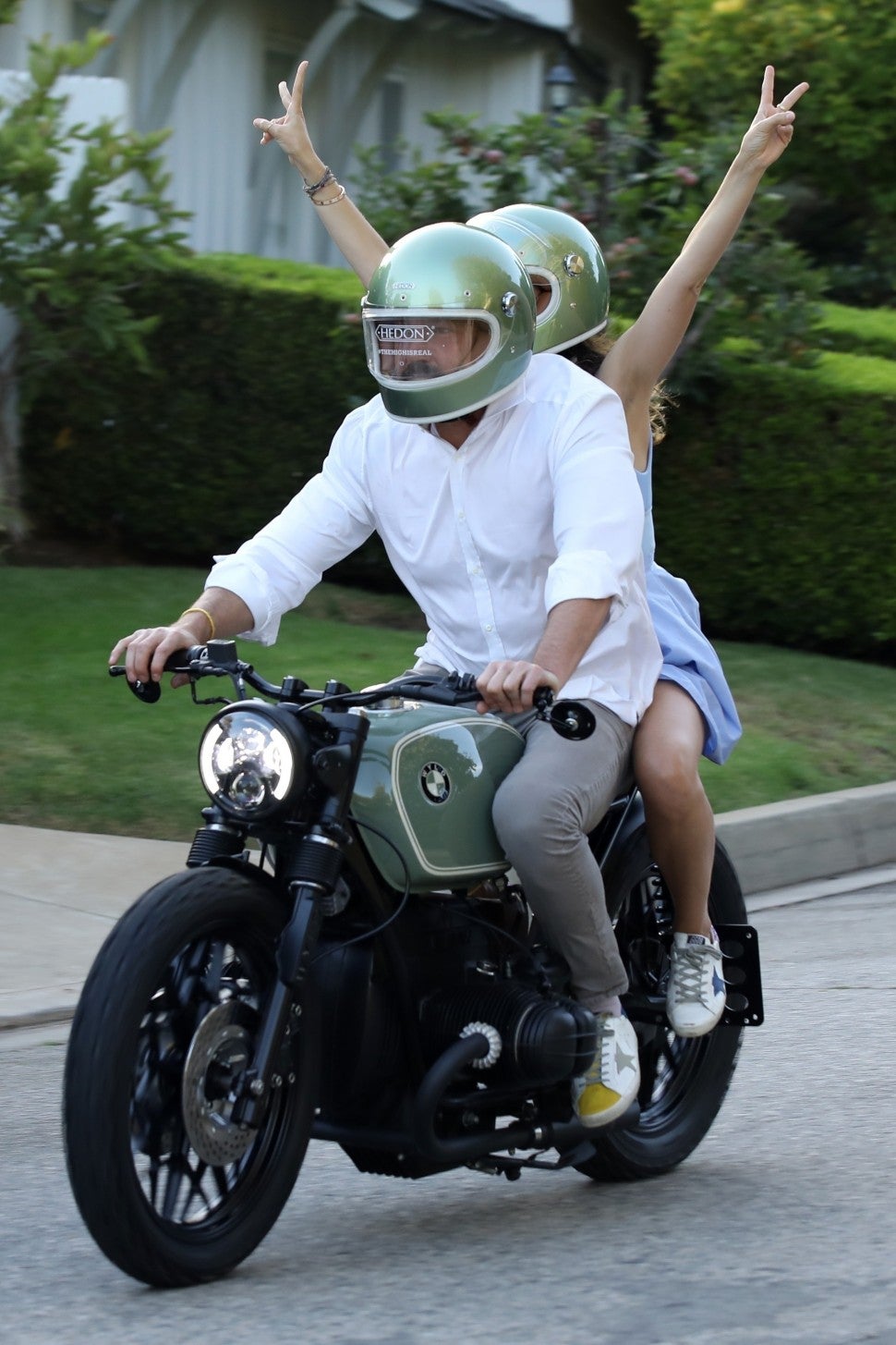 *EXCLUSIVE* -Ben Affleck goes out for a cruise with girlfriend Ana De Armas on his new BMW motorcycle that he presumably got as a birthday gift from her along with matching helmets! The pair were so excited to test drive the new bike that they wore their helmets with the stickers sill on the front. Ben turned 48 yesterday and the actor certainly seemed to have a happy one! *Shot on August 15, 2020*