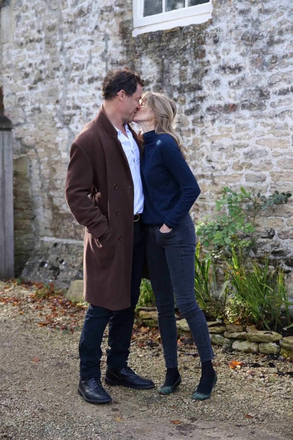 Dominic West and his wife Catherine Fitzgerald seen together at their family home after pictures emerged of the British actor kissing younger actress Lily James in Rome. The pair said they are staying together in a handwritten note that stated: "Our marriage is strong and we're very much still together. Thank you."