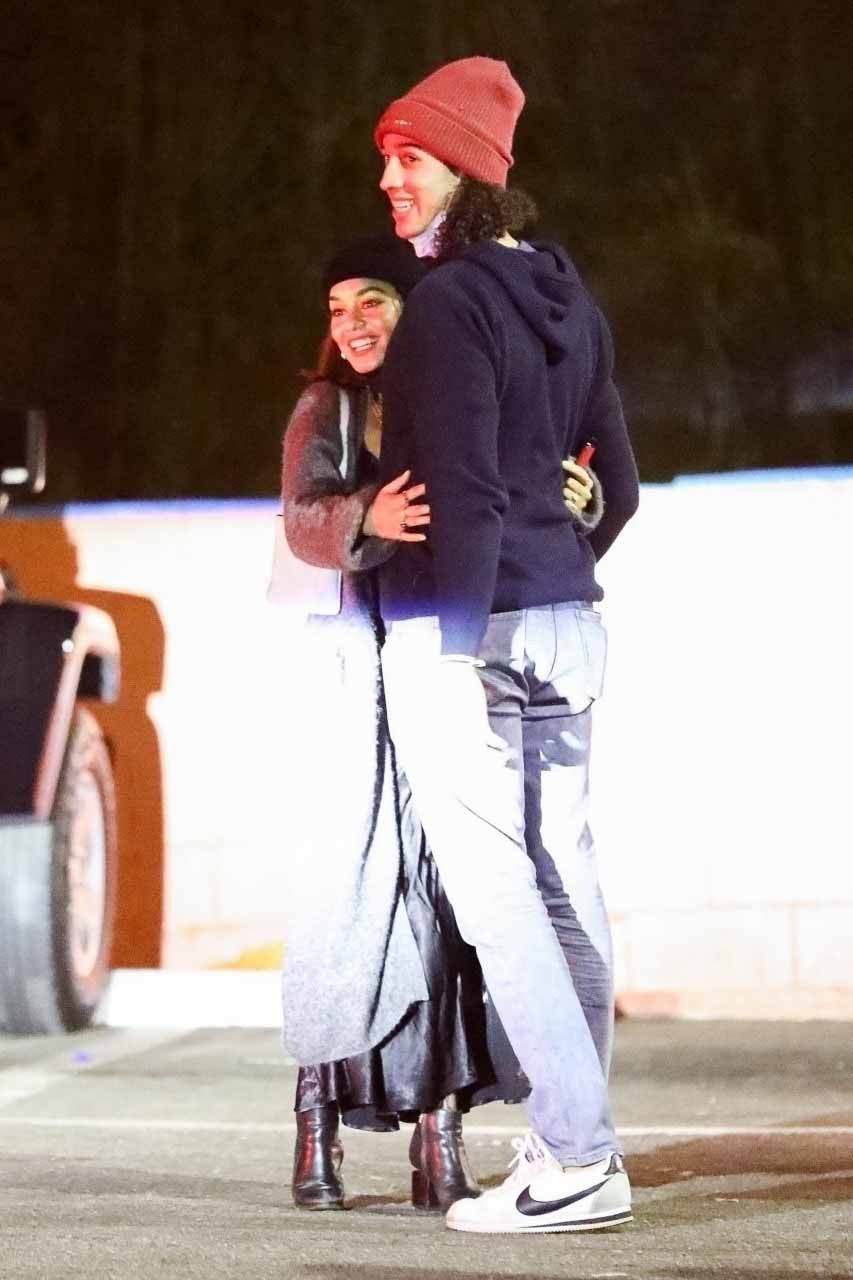 Vanessa Hudgens looks smitten as she hugs 24 year old baseball player Cole Tucker after a dinner date in Los Angeles.