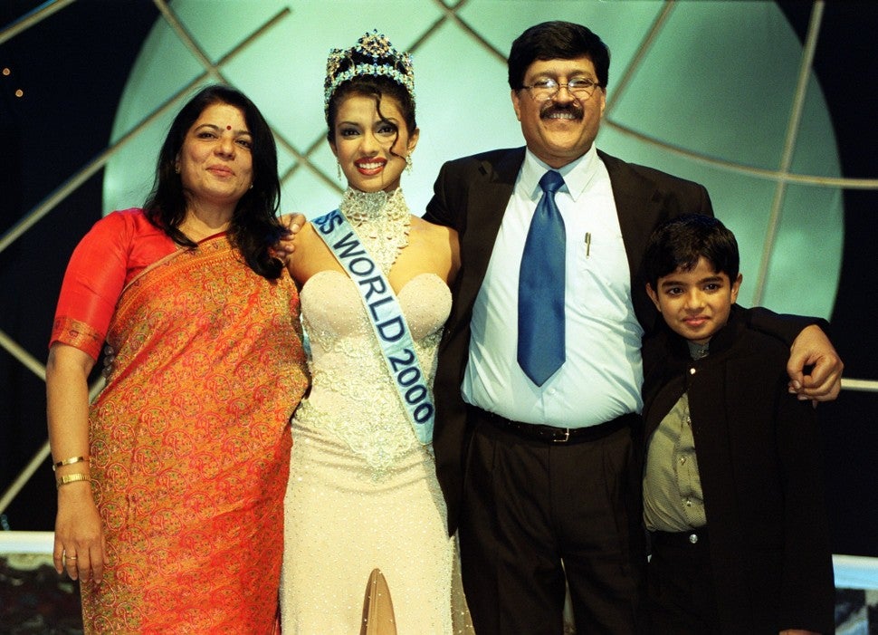 Priyanka Chopra with her parents and brother