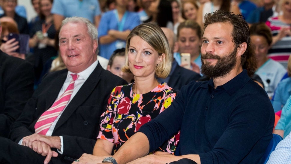 Northern Irish actor Jamie Dornan (right) with his sister Jessica Dornan Lynas and father Dr Jim Dornan, during the Pancreatic Cancer charity NIPanC launch at the Mater Hospital in Belfast.