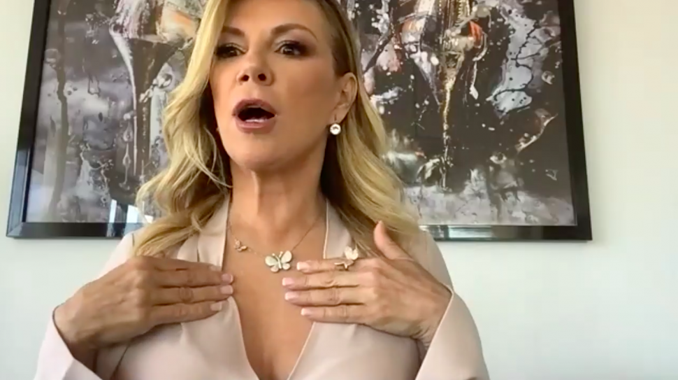 Ramona Singer shows off her butterfly jewelry.