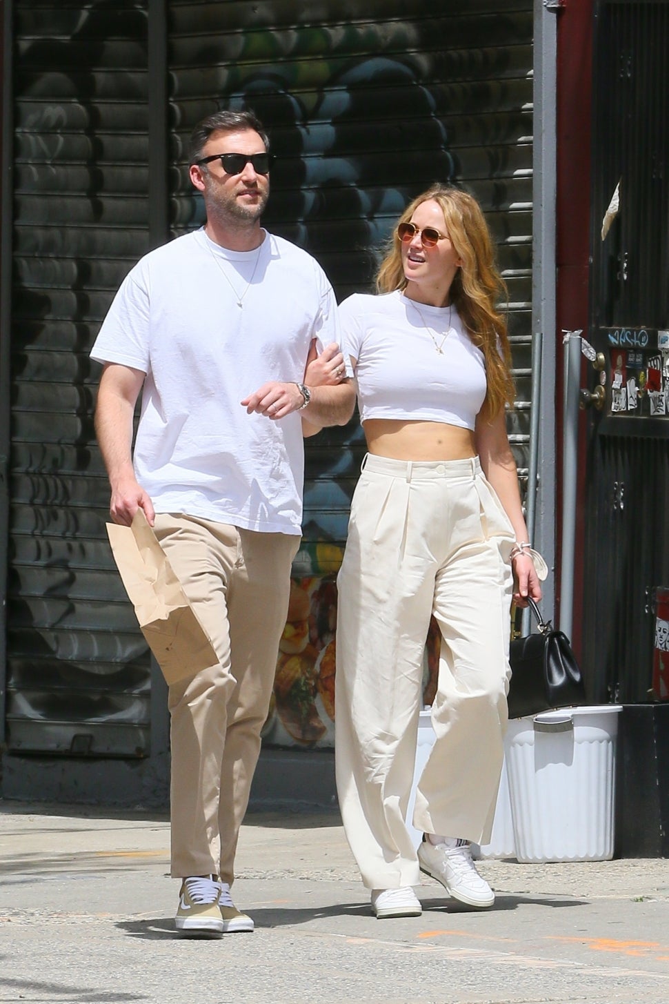 ennifer Lawrence and Cooke Maroney are a matching duo while walking home arm in arm after a lunch date in SoHo.