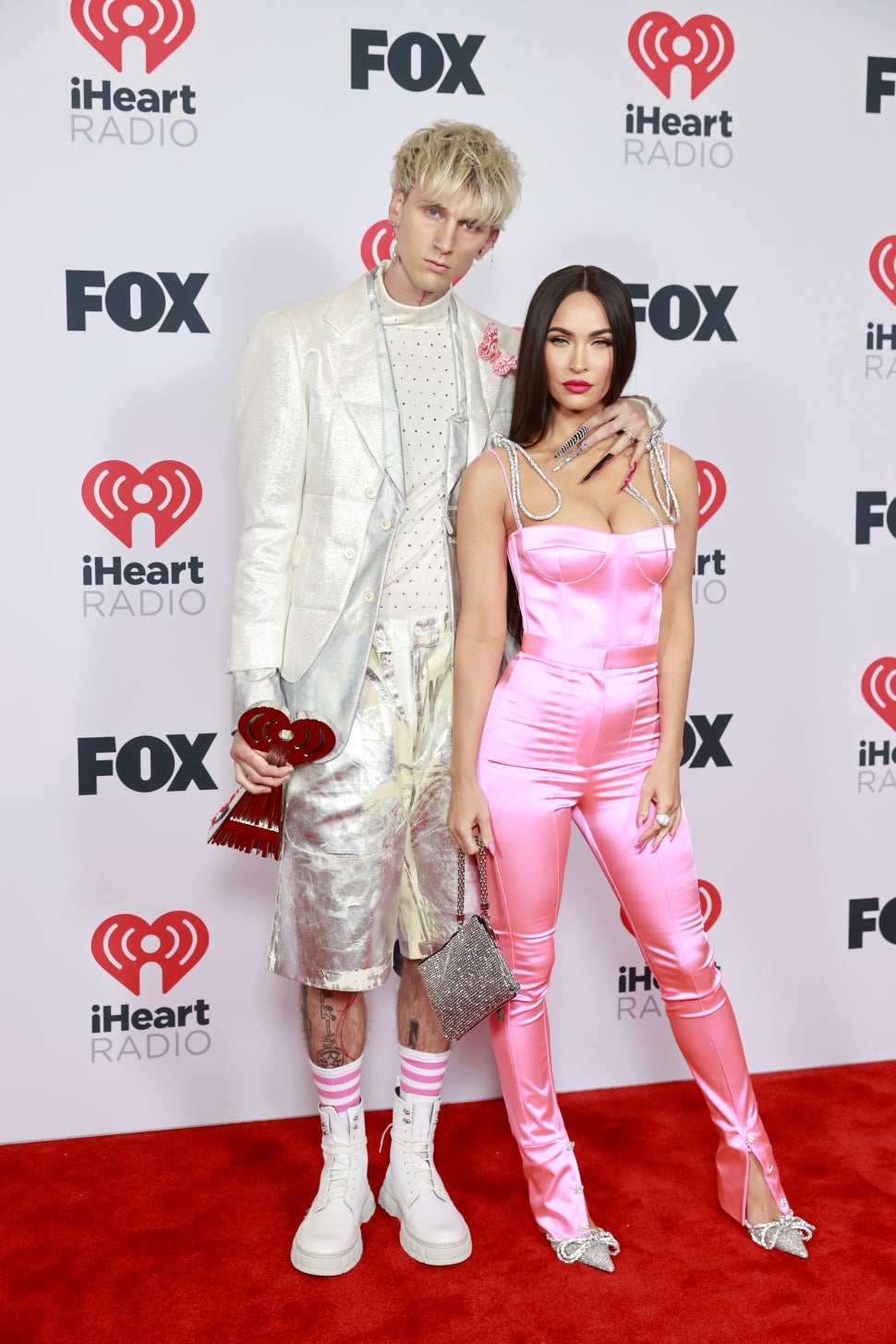 Machine Gun Kelly Shows Off Super Long Nails on Red Carpet With Megan Fox at 2021 iHeart Radio Awards | Entertainment Tonight