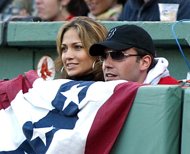 Jennifer Lopez and Ben Affleck attend a Red Sox game at Fenway Park on Oct. 11, 2003.