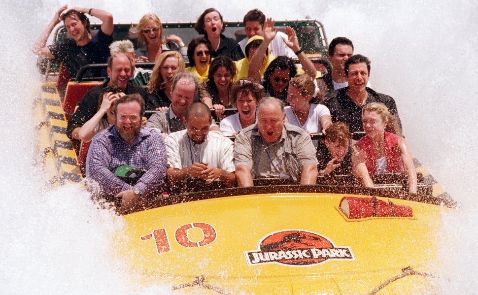 Various actors from Jurassic Park splash down at the ride's finale. 