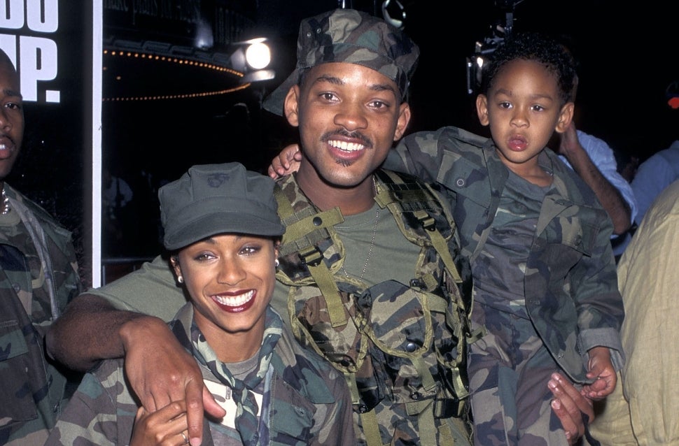 Jada Pinkett Smith, Will Smith and Trey Smith attend the premiere of Independence Day.