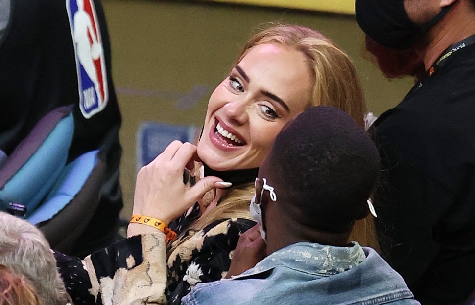 Singer Adele smiles during the second half in Game Five of the NBA Finals between the Milwaukee Bucks and the Phoenix Suns at Footprint Center on July 17, 2021 in Phoenix, Arizona.
