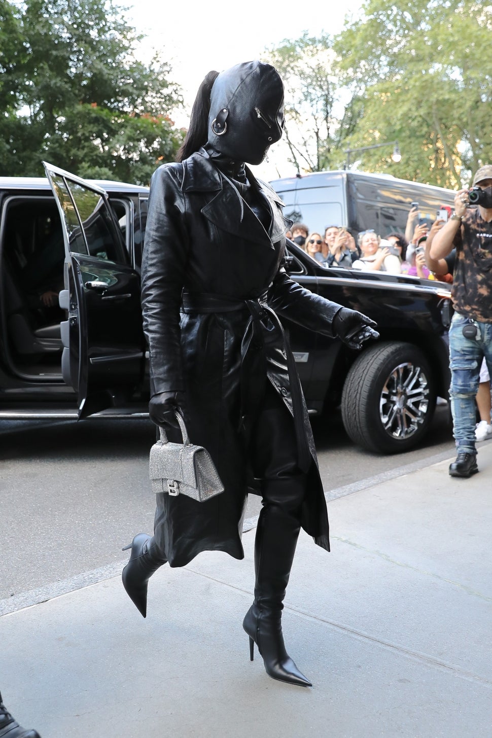 Kim Kardashian Covered head to toe with a leather suit while arrives at her hotel in NYC