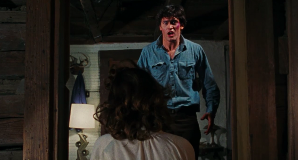 Bruce Campbell looking terrified in 'The Evil Dead.'