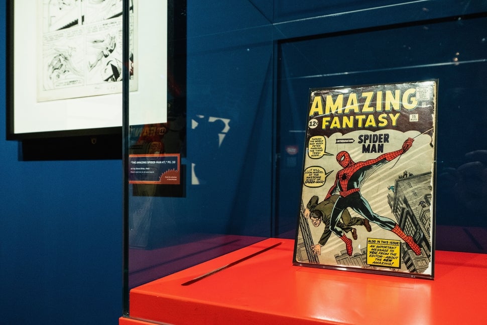 Spider-Man comic book in a display case.