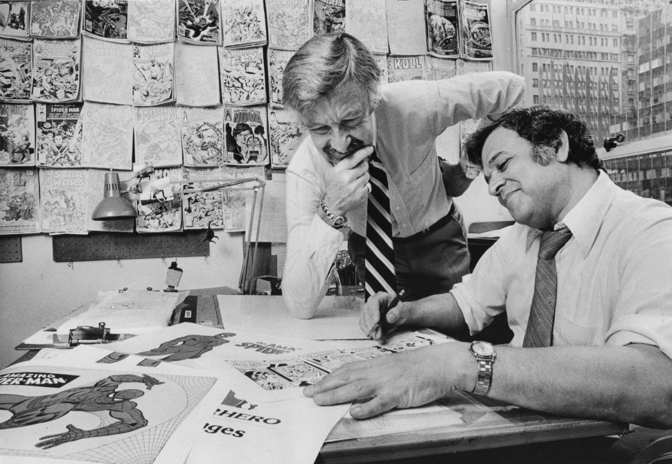 Stan Lee working in the Marvel Comics office.