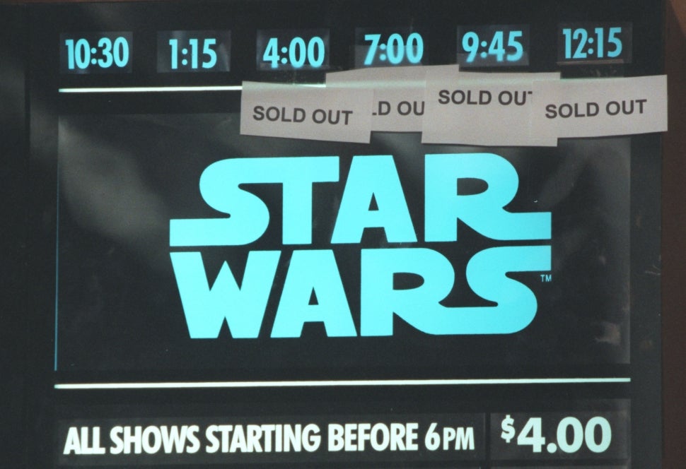 Movie theater marquee displaying sold out showtimes for 'Star Wars: Special Edition."
