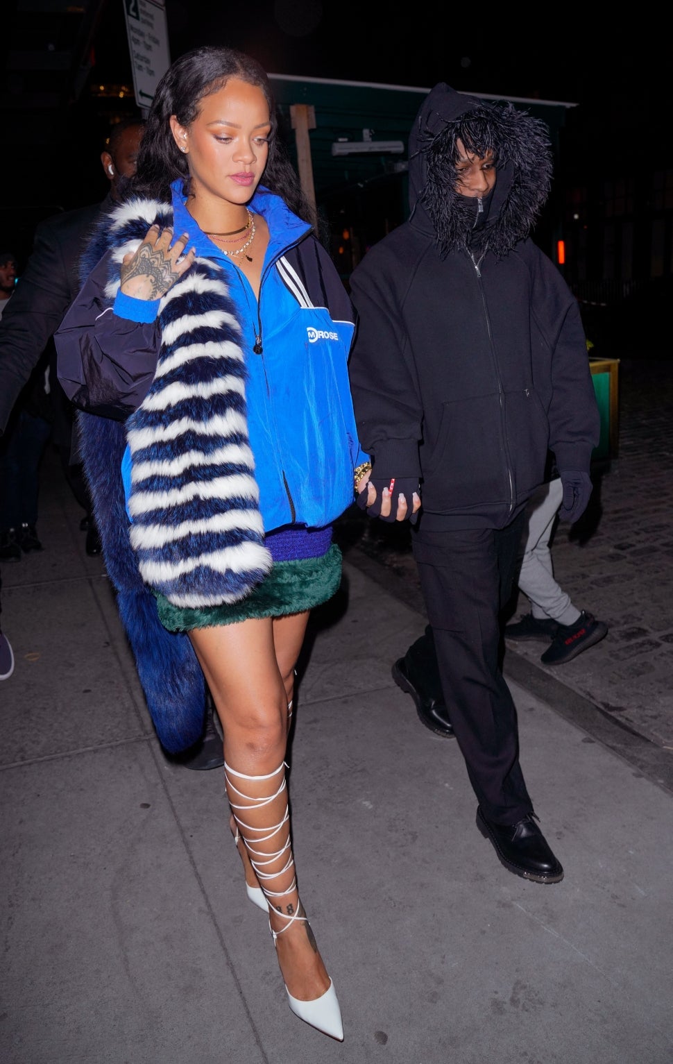 Rihanna and A$AP Rocky depart Pastis Restaurant on January 28, 2022 in New York City.