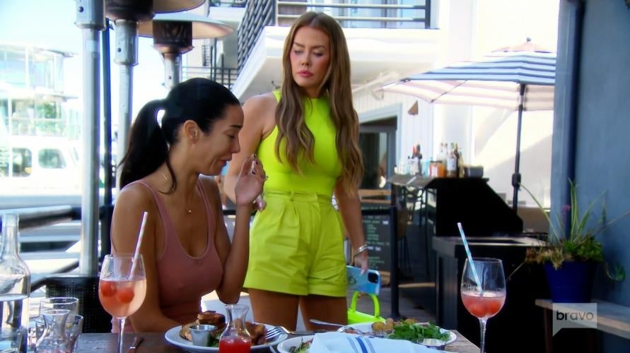Nicole James attempts to get Noella Bergener out of a restaurant before she makes a scene on The Real Housewives of Orange County