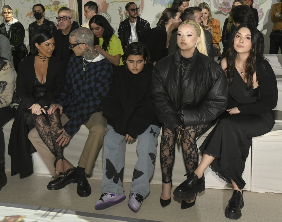 Kourtney Kardashian and Travis Barker and family