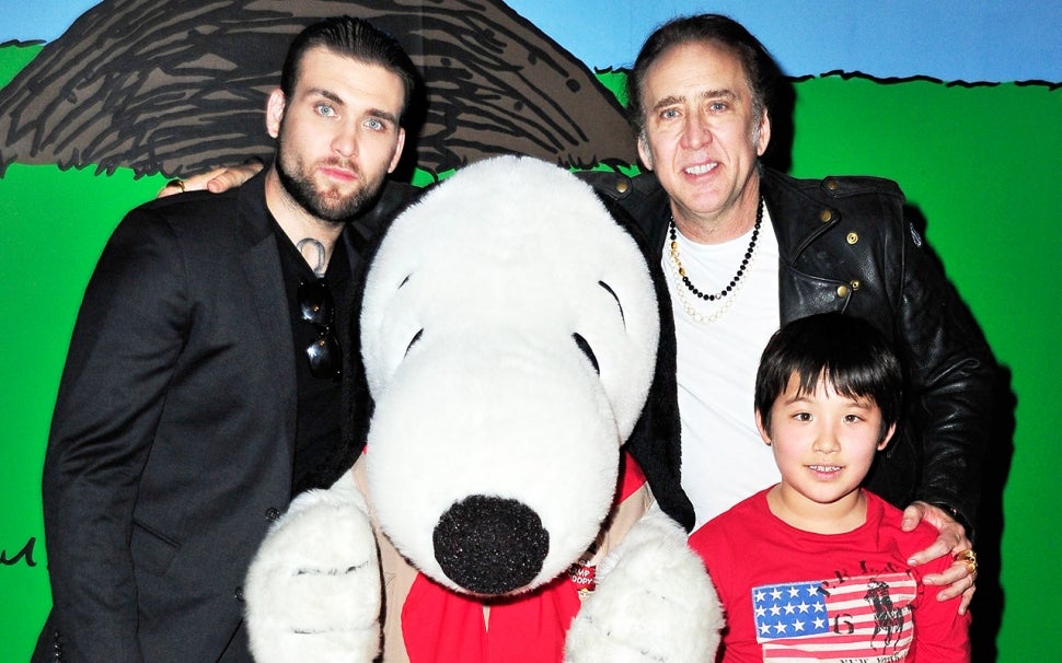 Nicholas Cage visits Knott's Berry Farm with sons Weston (L) and Kal-El on September 12, 2015 in Buena Park, California.