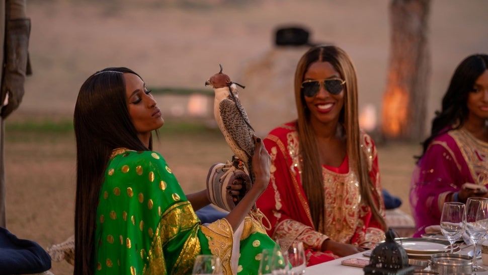 Chanel Ayan makes a kissy face to a falcon on The Real Housewives of Dubai