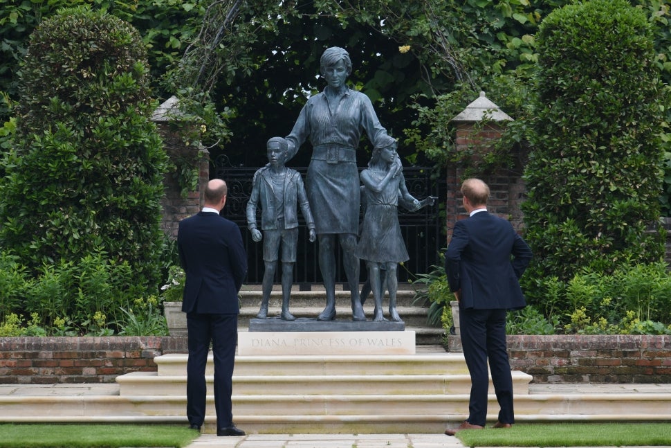 Prince William and Prince Harry at statue of Princess Diana