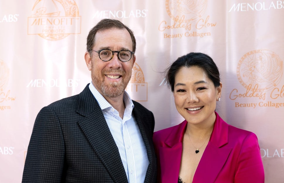 Rob Minkoff and Crystal Kung Minkoff attend a screening of The Real Housewives of Beverly Hills at Kathy Hilton's home