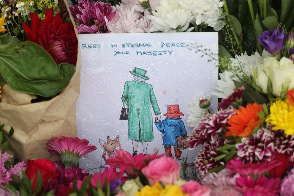 Flowers and Paddington Bear themed tributes for Queen Elizabeth II