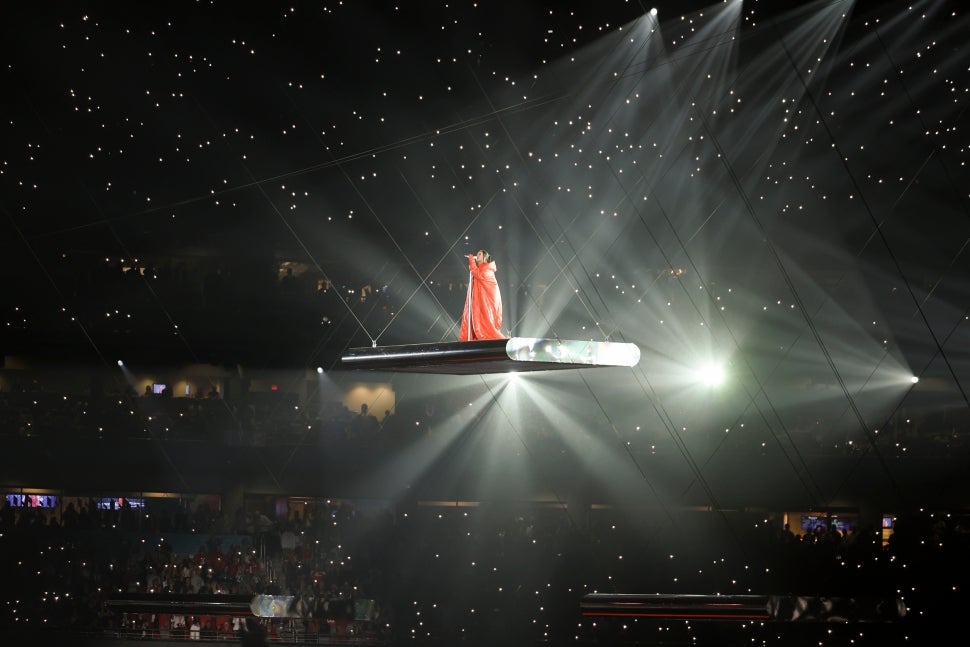 Rihanna takes the stage during the Super Bowl halftime show