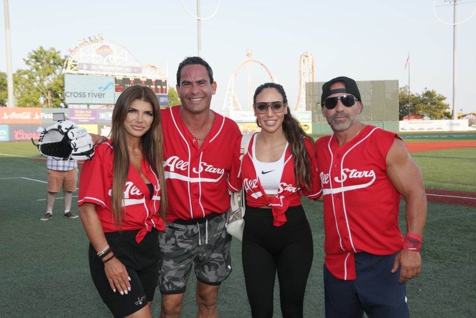Teresa Giudice, Luis Ruelas, Melissa Gorga and Joe Gorga of The Real Housewives of New Jersey attend the 2021 Battle for Brooklyn celebrity softball game at Maimonides Park
