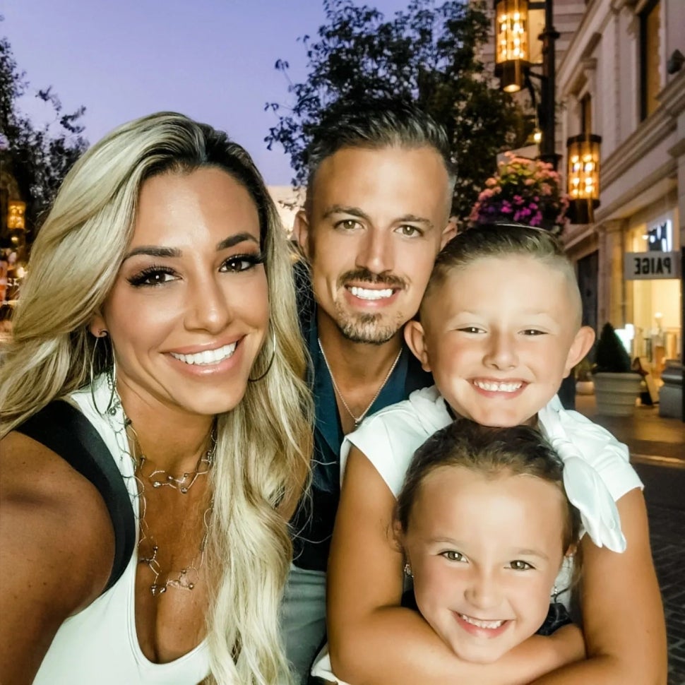 Danielle Cabral and her family pose for a selfie