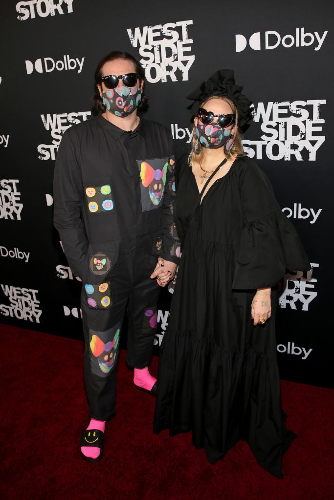 Sia (R) and guest attends the Los Angeles premiere of West Side Story, held at the El Capitan Theatre in Hollywood, California on December 07, 2021.