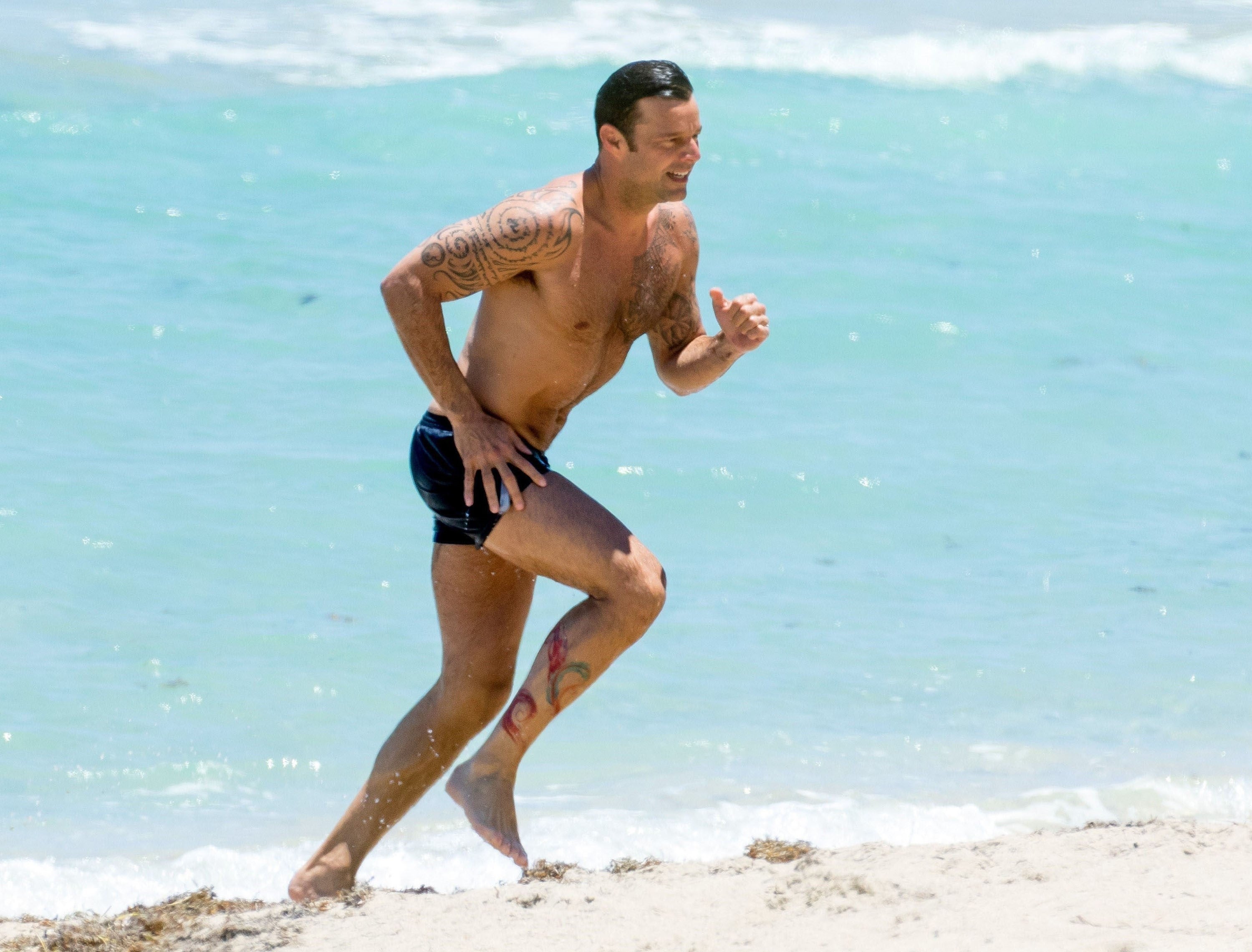 Ricky Martin Shows Off His Buff Bod as He Hits the Beach in Miami - See the Pic! | Entertainment Tonight
