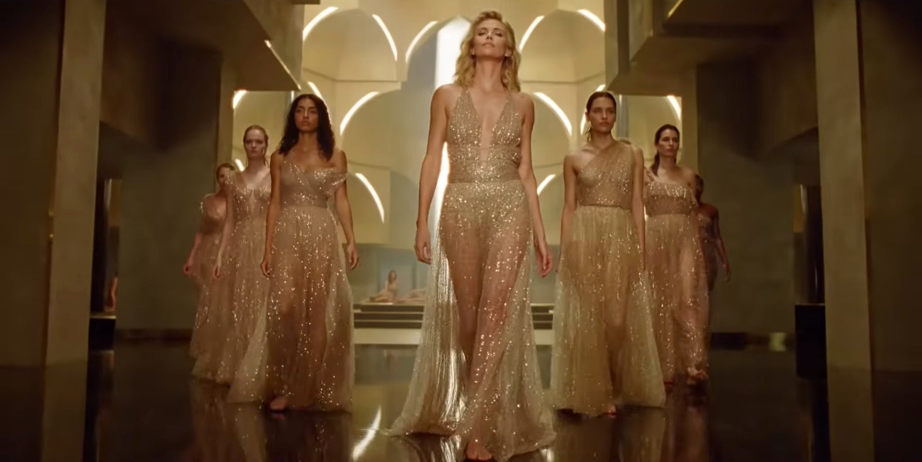 charlize theron gold dress dior Charlize Theron dazzles in new J'adore Dior campaign