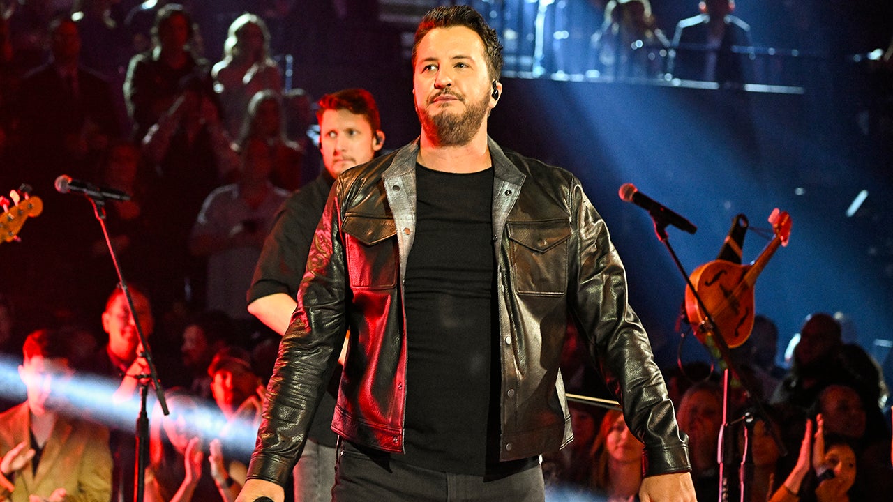 Luke Bryan Falls on Stage After Slipping on a Fan's Phone: 'My Lawyer Will Be Calling'