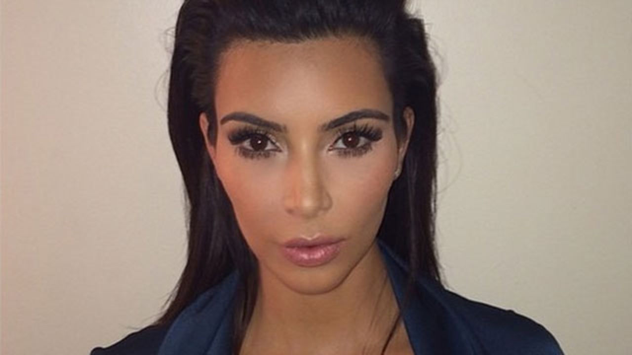 Even Kim Kardashian's Passport Photo Shows Off Her Cleavage | Entertainment  Tonight