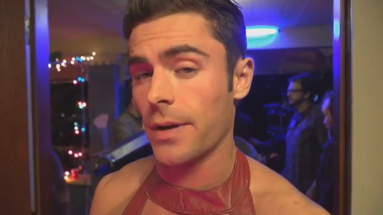 Watch Zac Efron Flaunt His Body In A Sexy Red Dress In Neighbors 2
