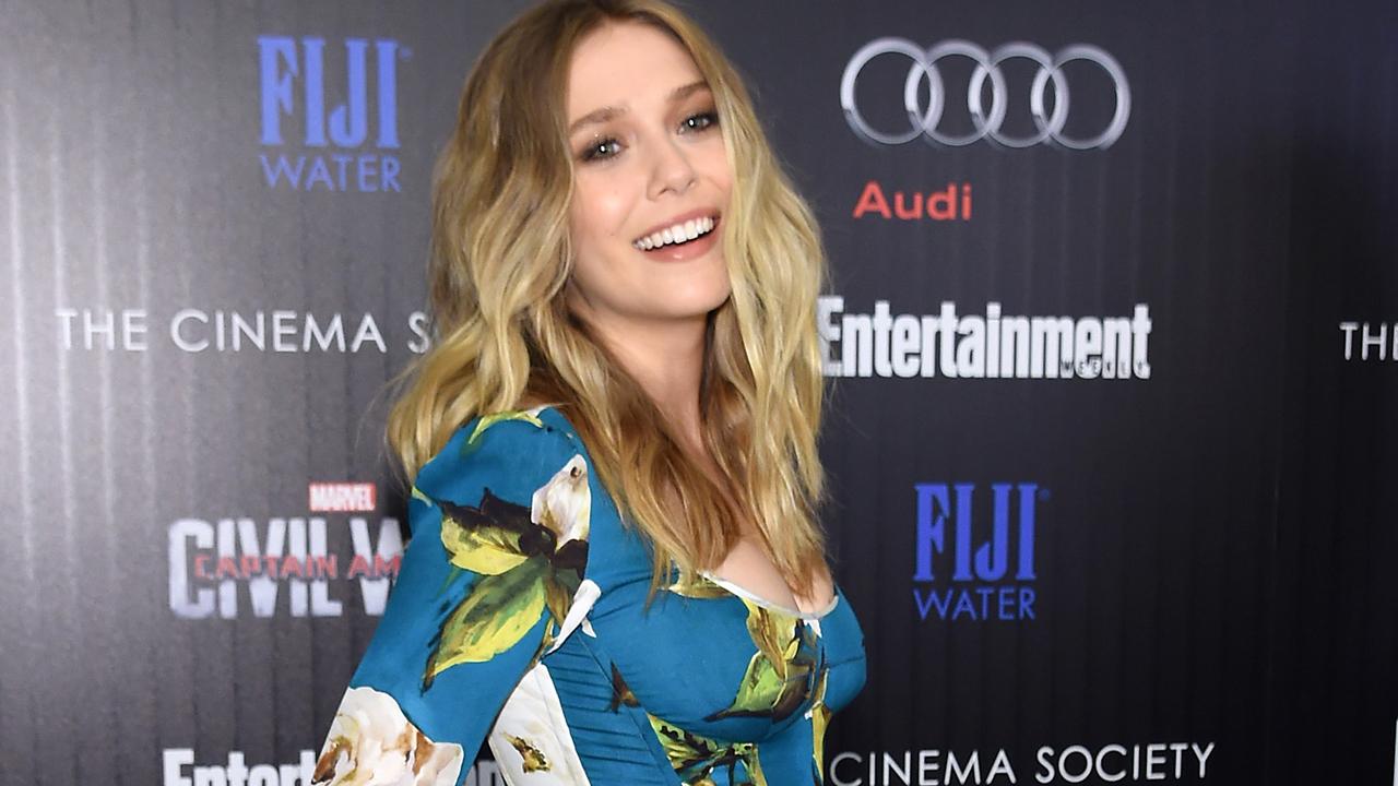 Elizabeth Olsen Reveals Red Carpet Gowns Make Her Feel 'Very  Self-Conscious' About Her Boobs | Entertainment Tonight